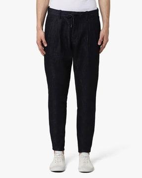 textured pleated-front trousers
