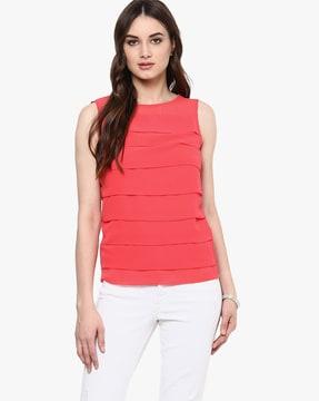 textured sleeveless pleated top with sheer panels