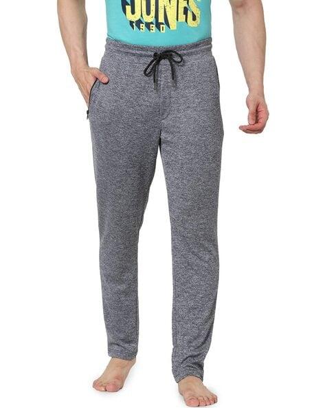 textured track pants with insert pockets