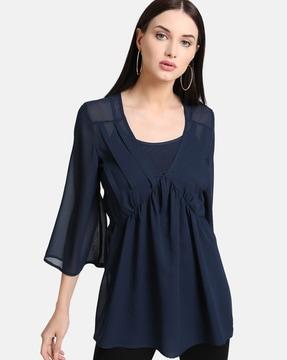 textured tunic with flared sleeves