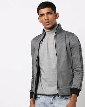 textured zip-front jacket with typographic taping