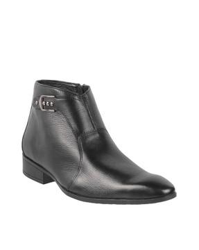textured zip-up ankle boots with buckle accent