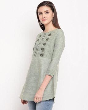 textured a-line tunic with embroidery
