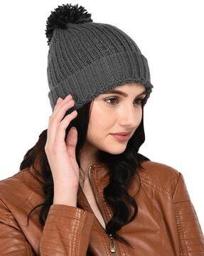 textured beanie cap with pom-pom detail