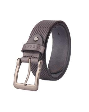 textured belt with tang-buckle closure