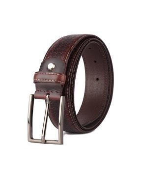 textured belt with tang-buckle closure