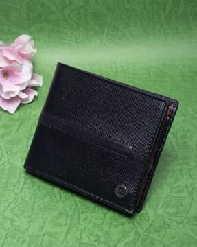textured bi-fold wallet with metal accent