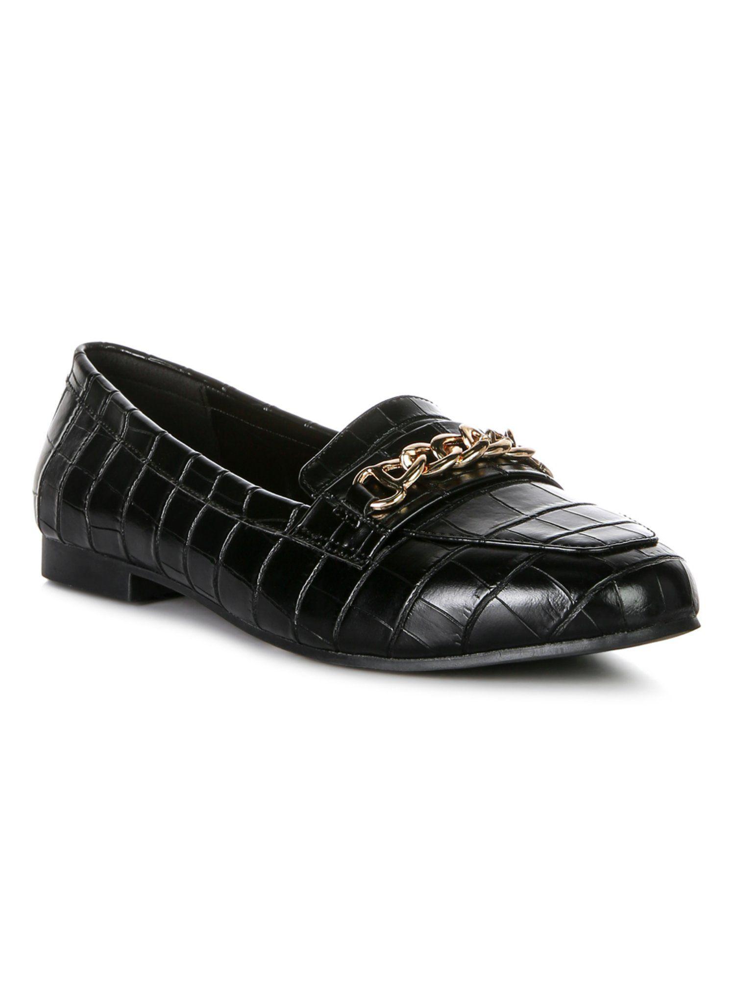 textured black loafers