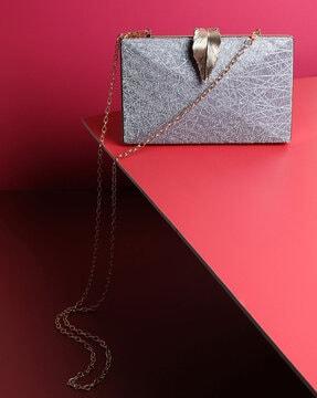 textured classic clutch with detachable strap