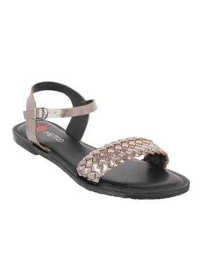textured flat sandals with buckle closure