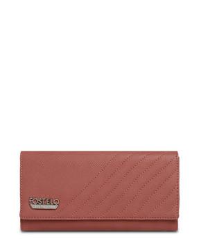 textured fold-over clutch