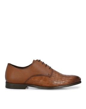 textured lace-up derbys