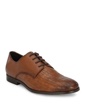 textured lace-up derbys