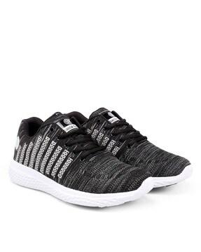 textured lace-up sports shoes