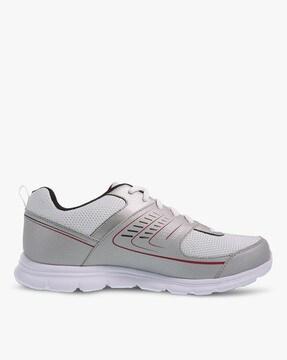 textured lace-up sports shoes