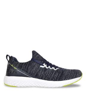 textured lace-up sports shoes