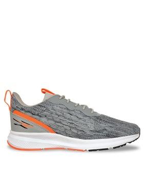 textured lace-up sports shoes