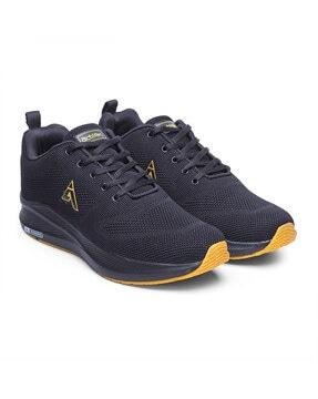 textured lace-up sports shoes