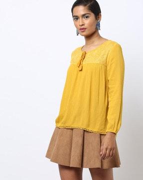 textured lace-yoke top with neckline tie-up
