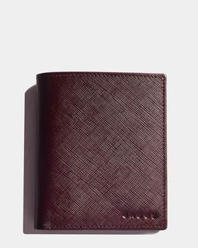 textured leather bi-fold wallet