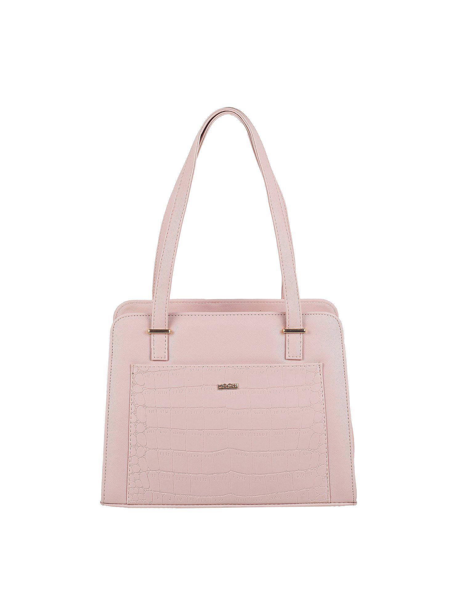 textured light pink handbag