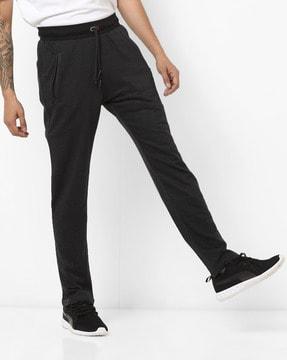 textured mid-rise track pants with zip pockets