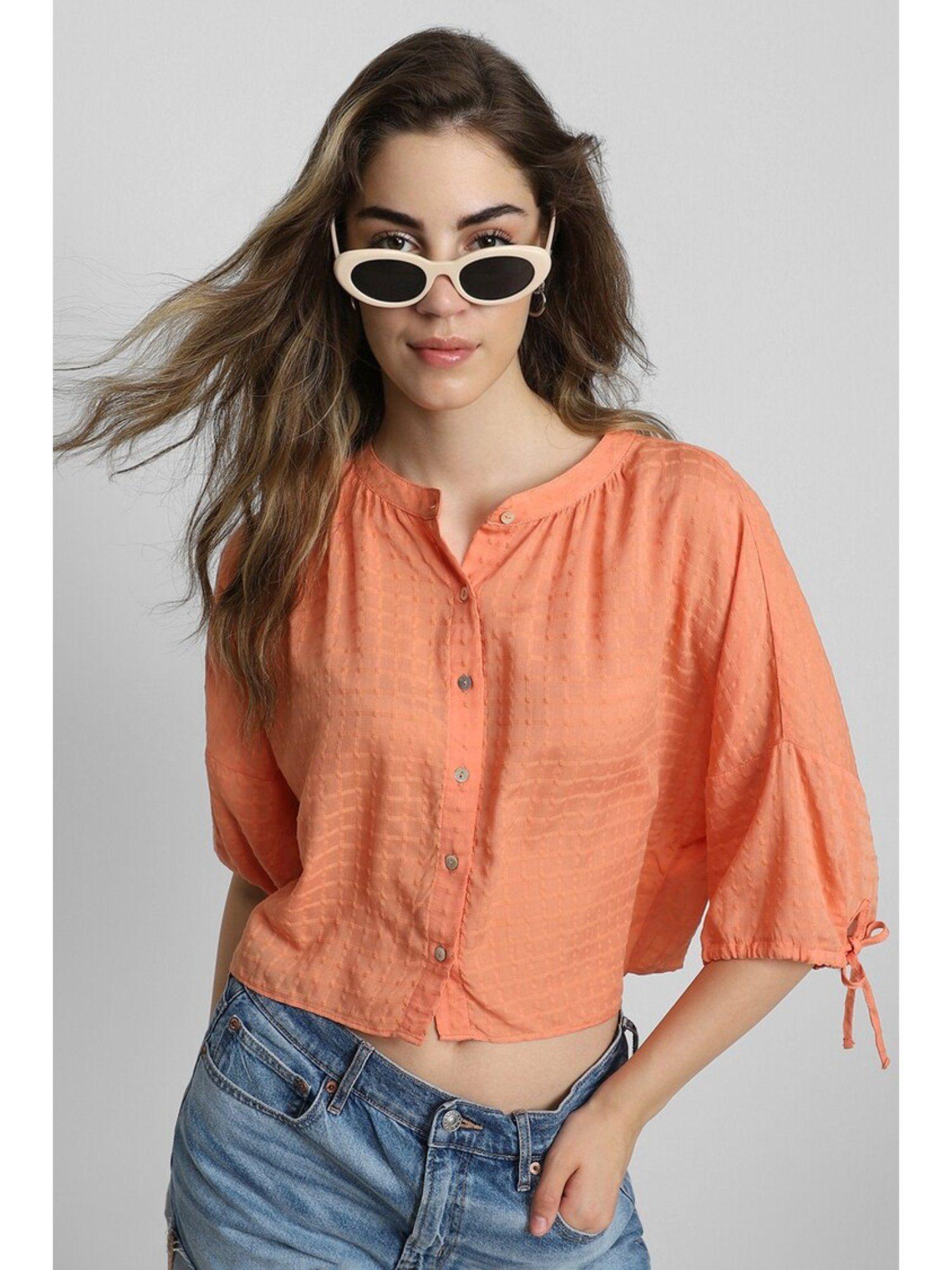 textured orange shirt