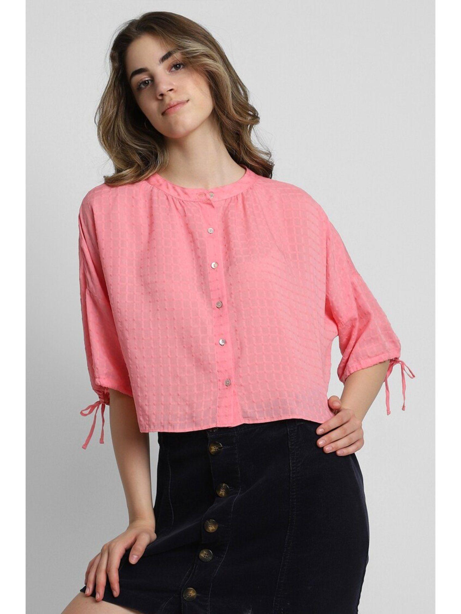 textured pink shirt