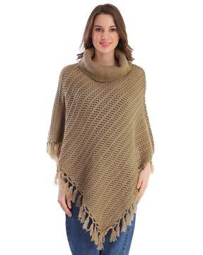 textured poncho with tassels