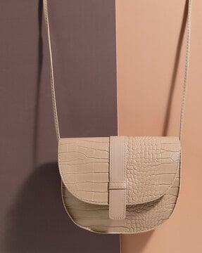 textured print sling bag
