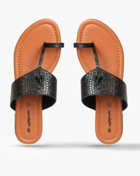 textured sandals with toe-ring
