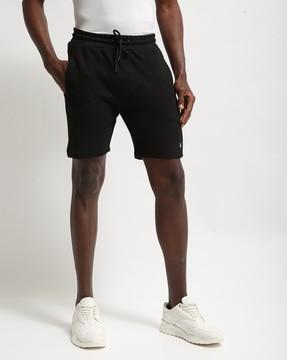 textured slim fit shorts with insert pockets