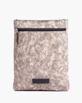 textured sling bag