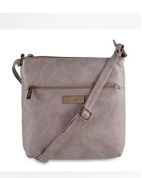 textured sling handbag