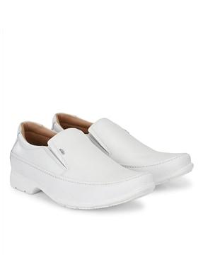 textured slip-on formal shoes with branding