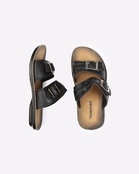 textured slip-on sandals with buckle accent