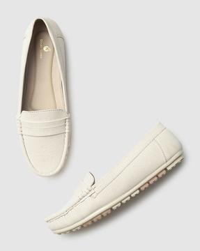 textured slip-on shoes