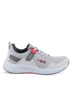 textured sports shoes with lace fastening