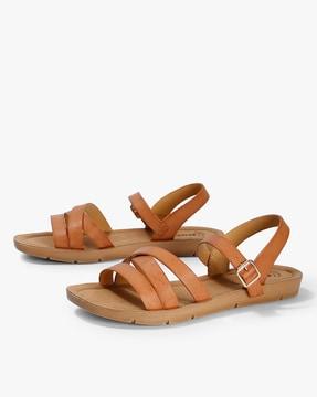 textured strappy flat sandals with buckle closure