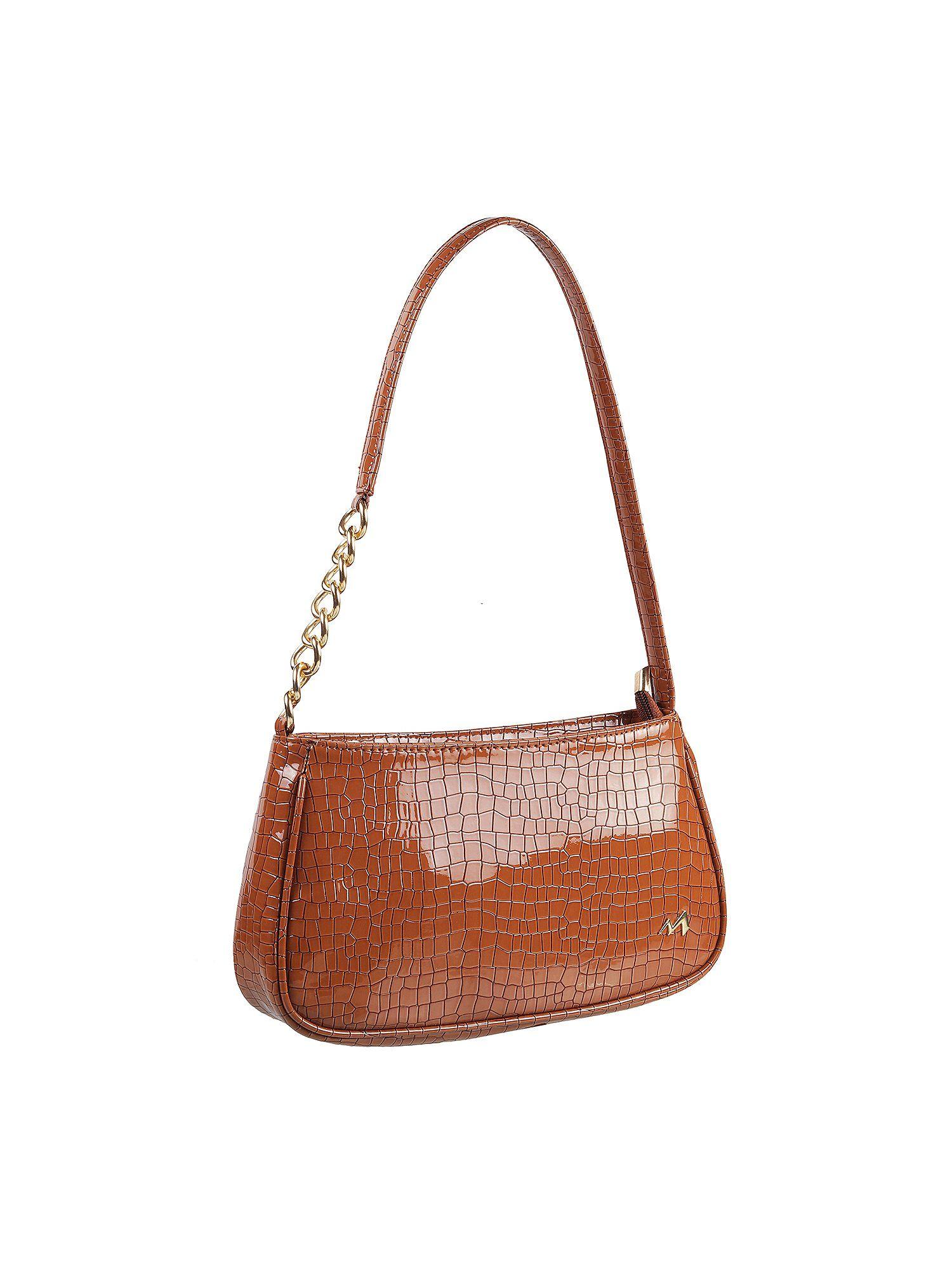 textured tan handbag