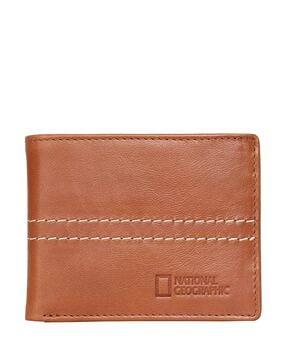 textured tri-fold wallet with snap-button closure