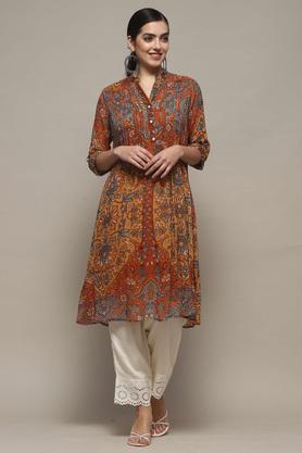 textured viscose round neck women's party wear kurti - mustard