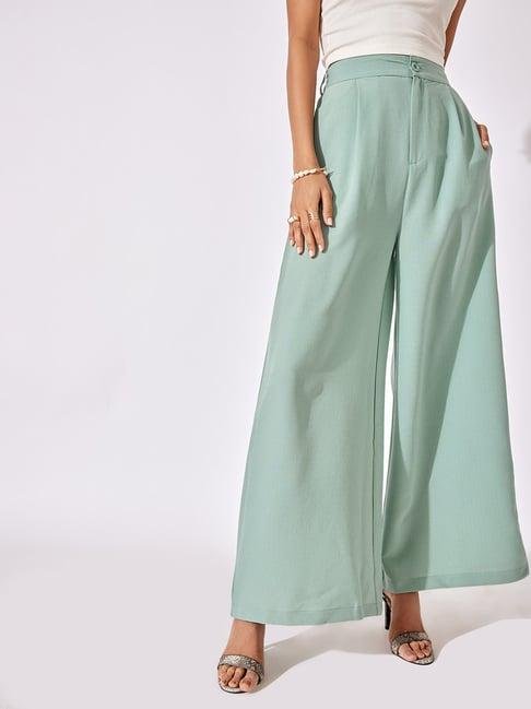 the label life sage green flare fit flared pants