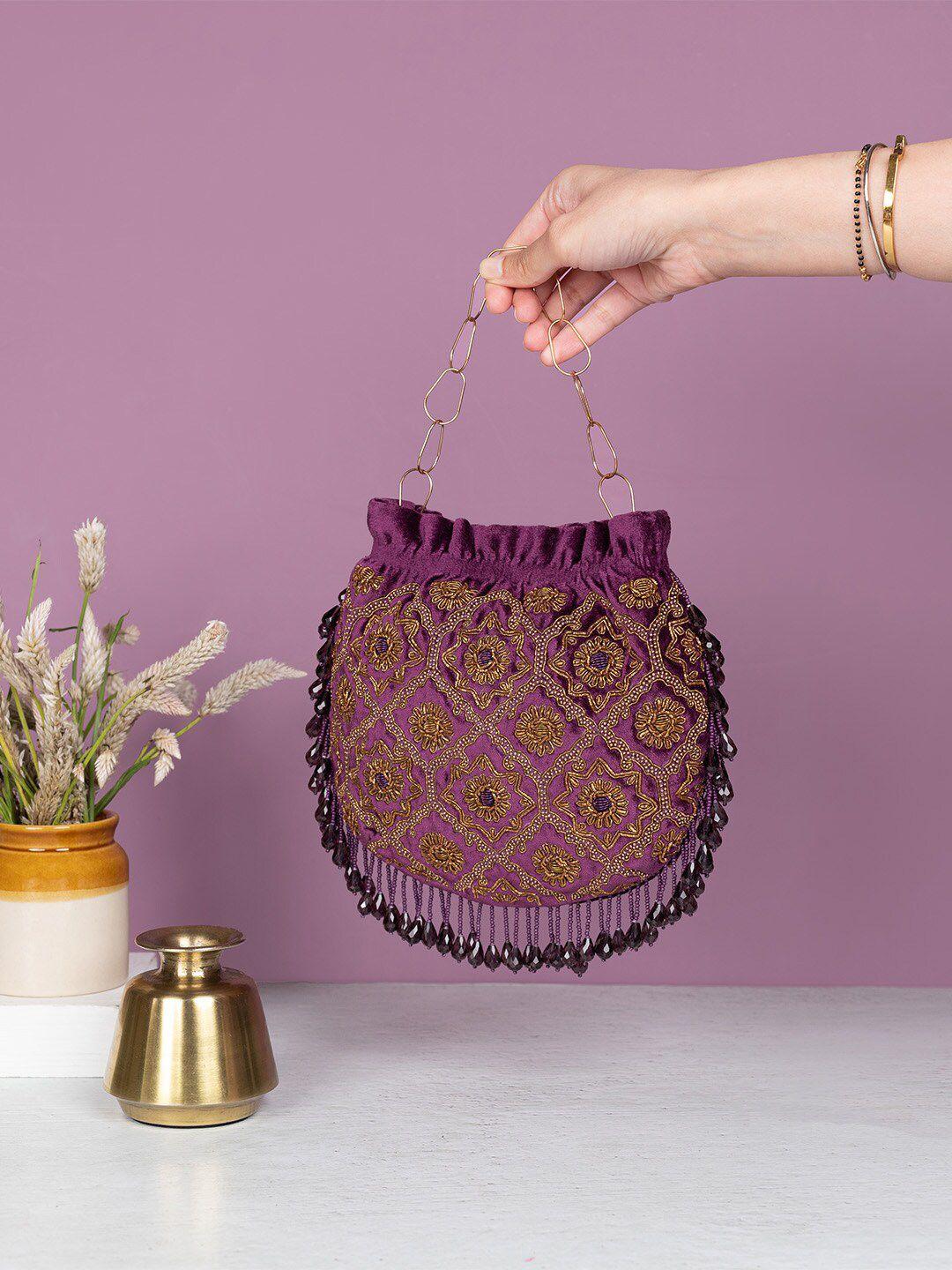 the leather garden embellished velvet potli bag
