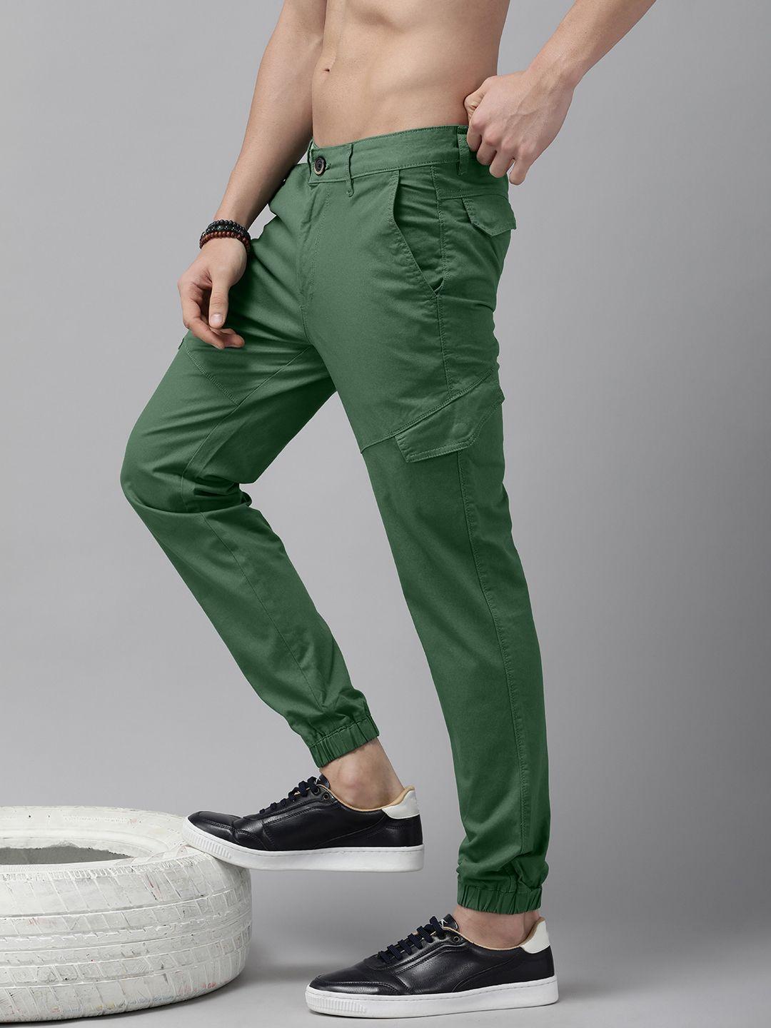 the roadster lifestyle co men green solid mid-rise regular fit joggers trousers