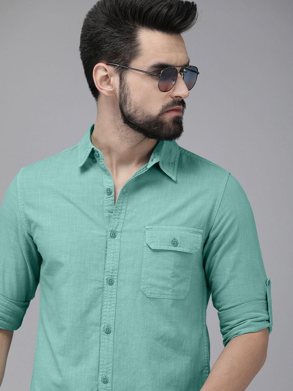 the roadster lifestyle co. men sea blue solid pure cotton casual shirt