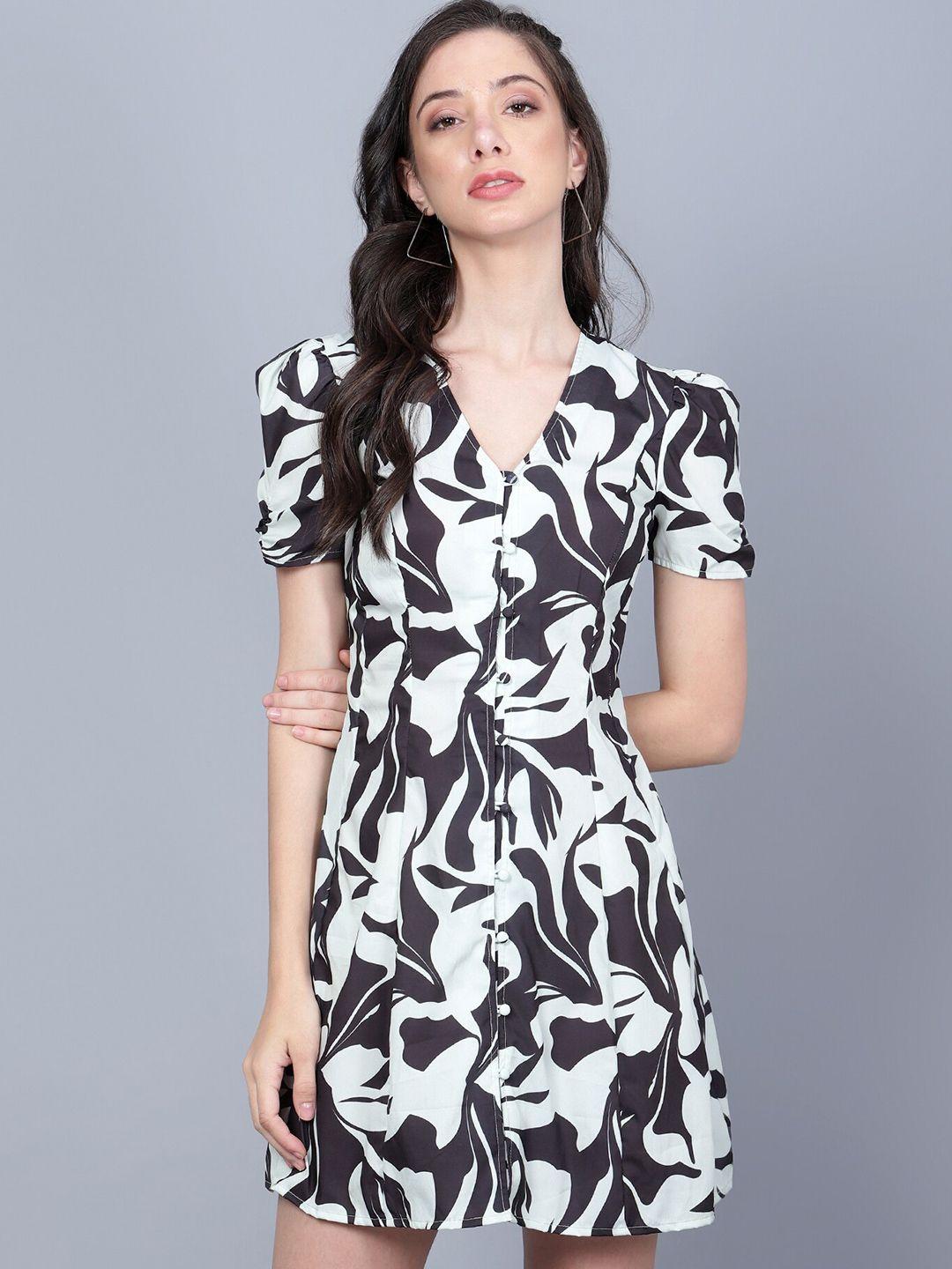 the roadster lifestyle co. white & black abstract printed v-neck smocked a-line mini dress