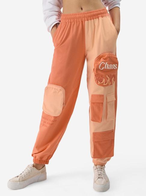 the souled store orange cotton graphic print relaxed fit mid rise joggers