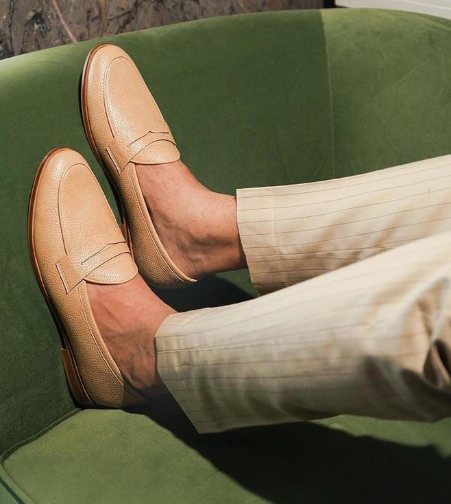 the alternate beige penny loafers