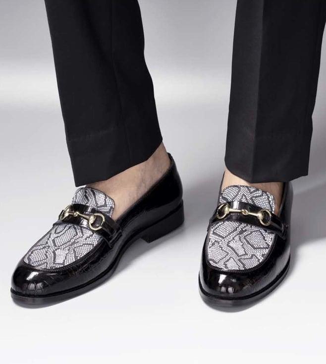 the alternate black textured slip-ons with buckle